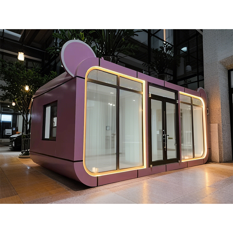 How do capsule houses, sleek and round like apples, achieve a perfect blend with nature?